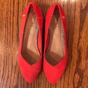 Toms size 9.5 flats in Red.  Barely worn.  Great condition.